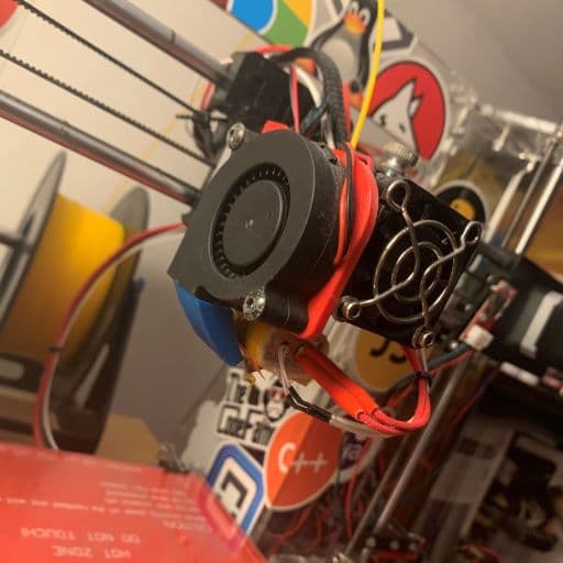 A custom-built cooling fan, mount, and nozzle system for a 3D printer. I built the original 3D Printer from a kit, and I designed this cooling system to improve the printer's capabilities and print-quality.
