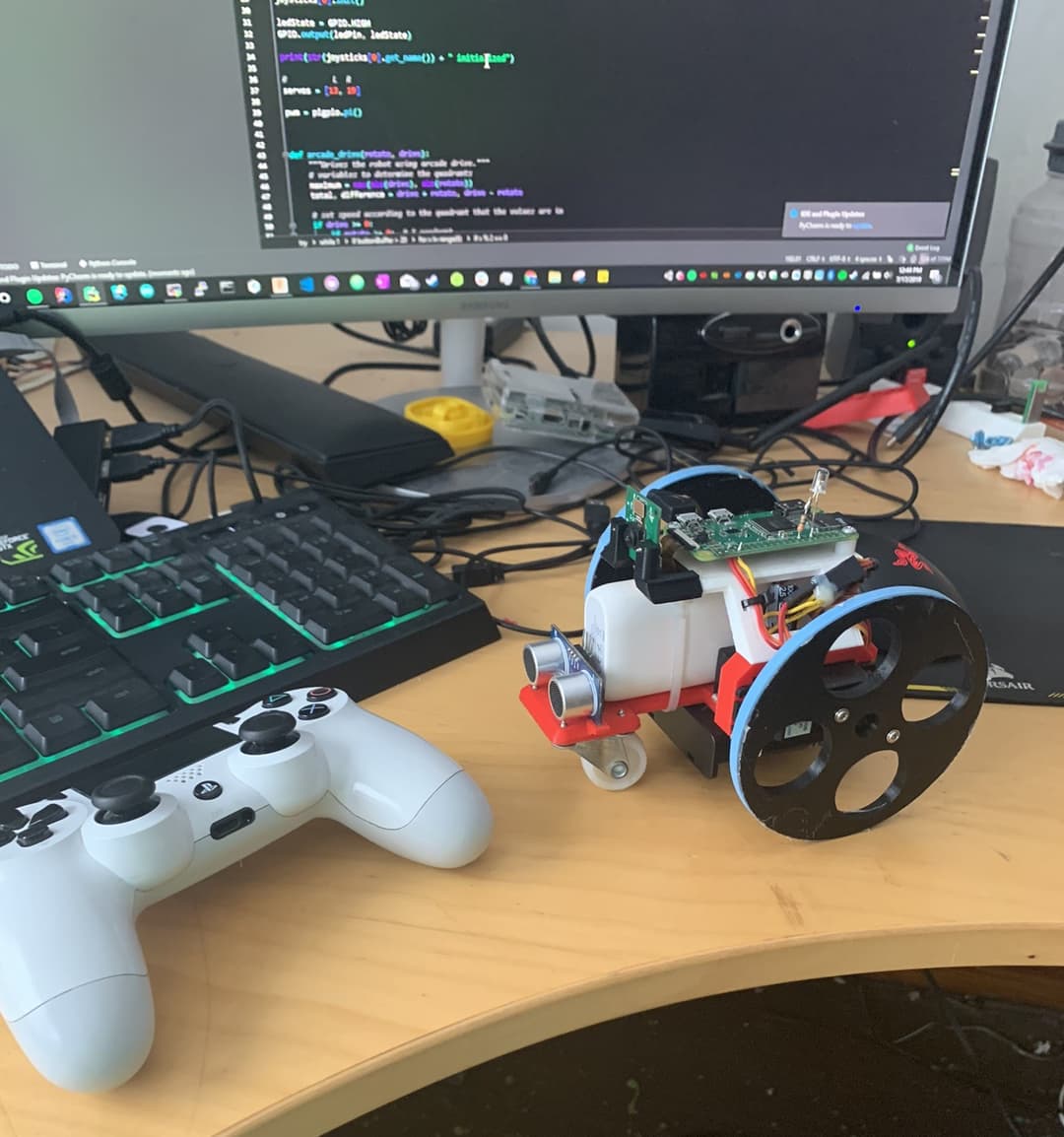 In version 1, robot had a camera, an ultrasonic sensor. A dynamic claw with 2 degrees of freedom was added later. The robot can be controlled with a DualShock 4 controller or run autonomously with computer vision.