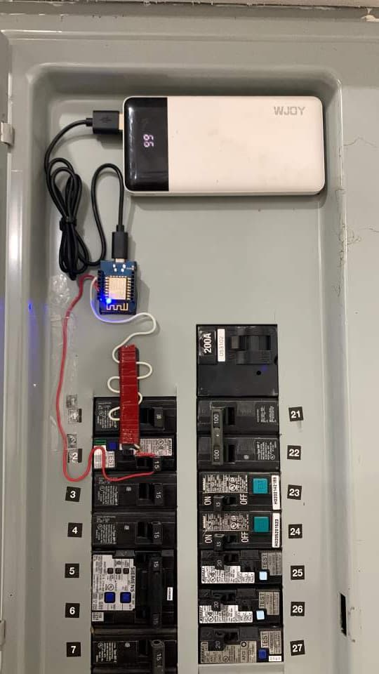 A custom-built breaker panel monitor that detects when a circuit is tripped and sends a notification to your phone.