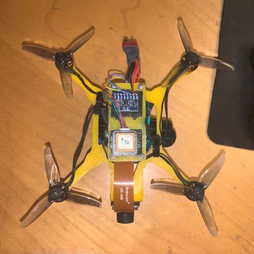 The top view of the quadcopter. Included a camera, IMU, and GPS module for navigation.