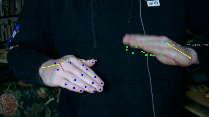 An ongoing independent research project that uses a variational autoencoder to generate percussive audio from hand gestures. The model builds upon RAVE, a state-of-the-art neural audio synthesis architecture, and trains on high-frame-rate recordings of conga drum performances (played by my dad) to capture fine hand movements. The goal is to make it possible to play any percussive instrument using only hand gestures and a camera.